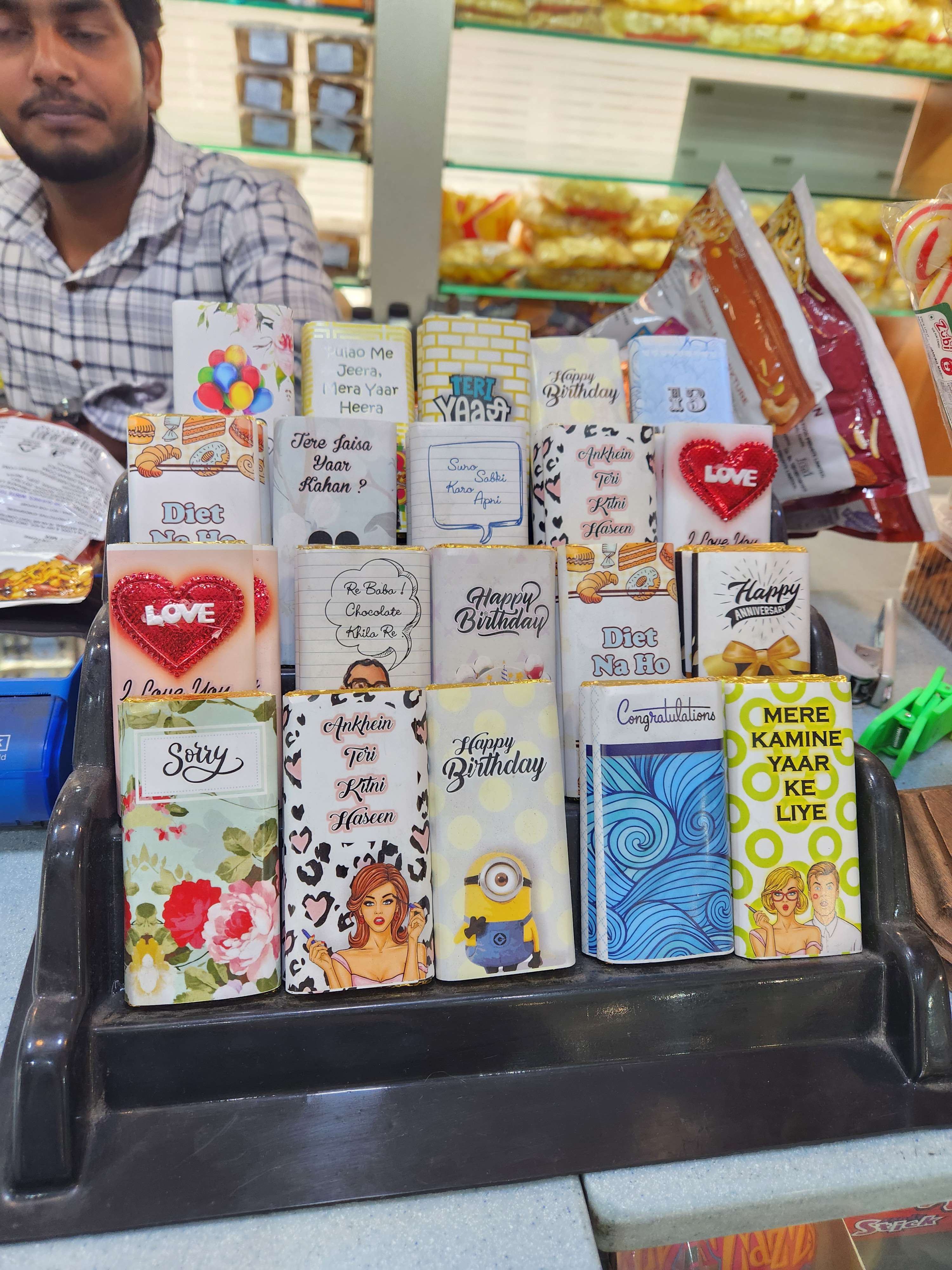 Printed gifting chocolates displayed in a market stall