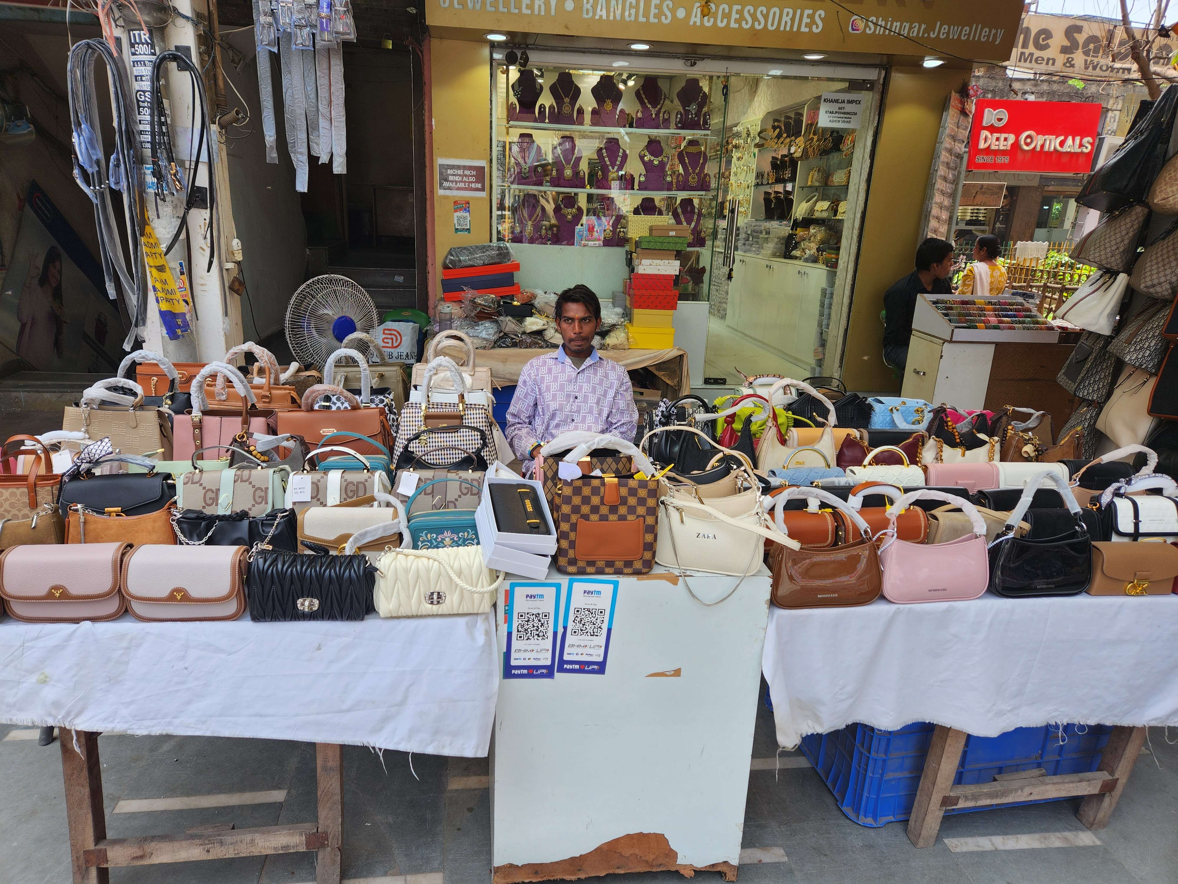 Handbags and purses displayed in a local market
